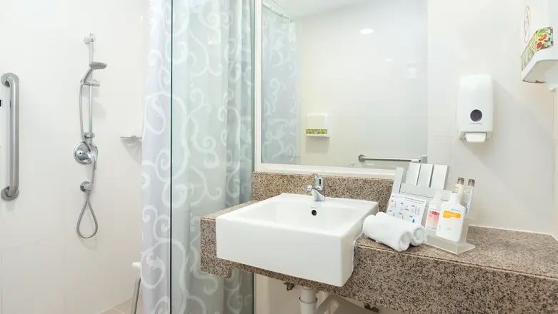 Ensuite bathroom with luxurious bath amenities