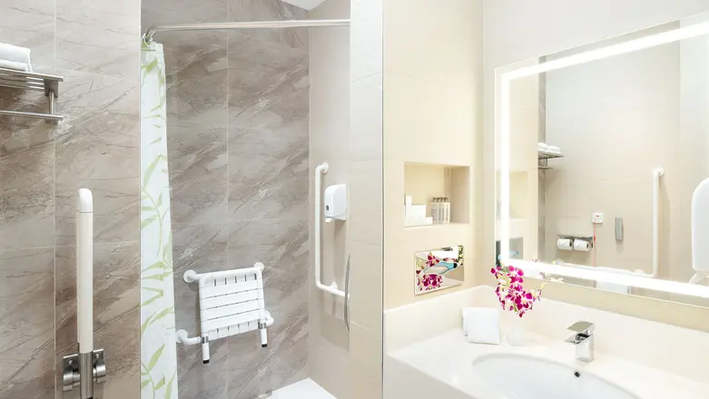 Spacious and brightly-lit ensuite bathroom