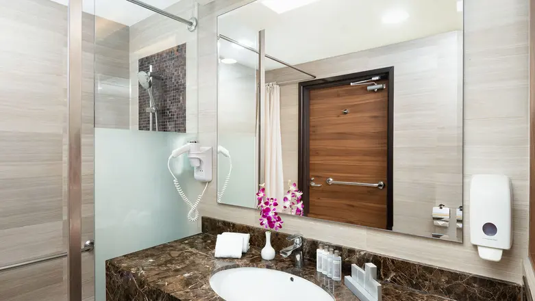 Spacious ensuite bathroom with premium bath amenities