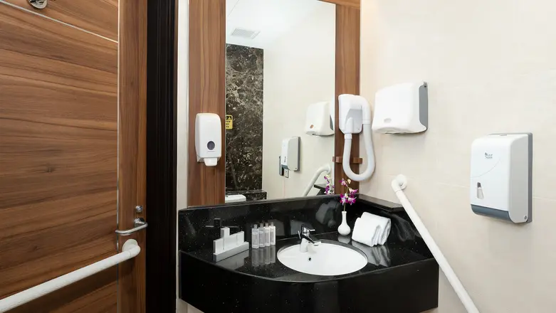 Premium bath amenities are provided in the ensuite bathroom