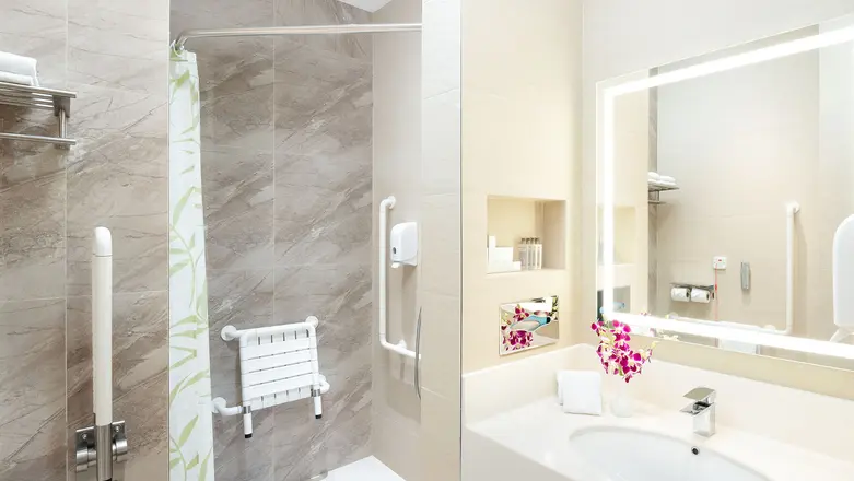 Freshen up in the bright and spacious ensuite bathroom