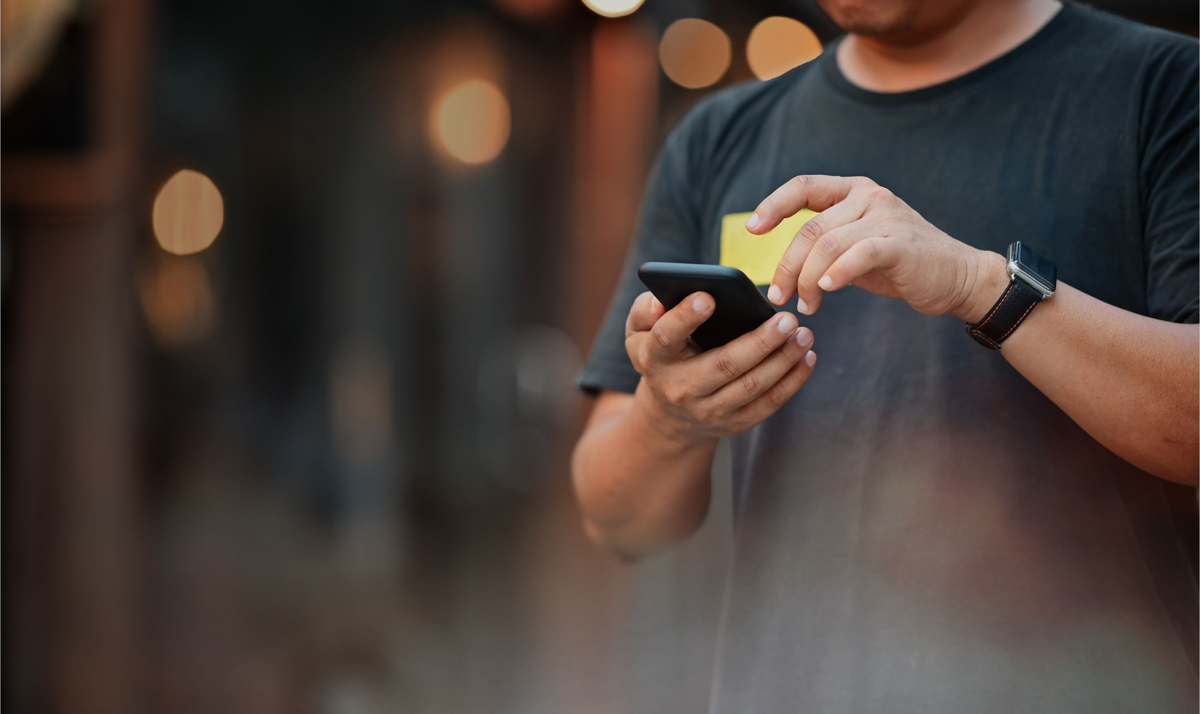 Mobile phone in hand 1053479878