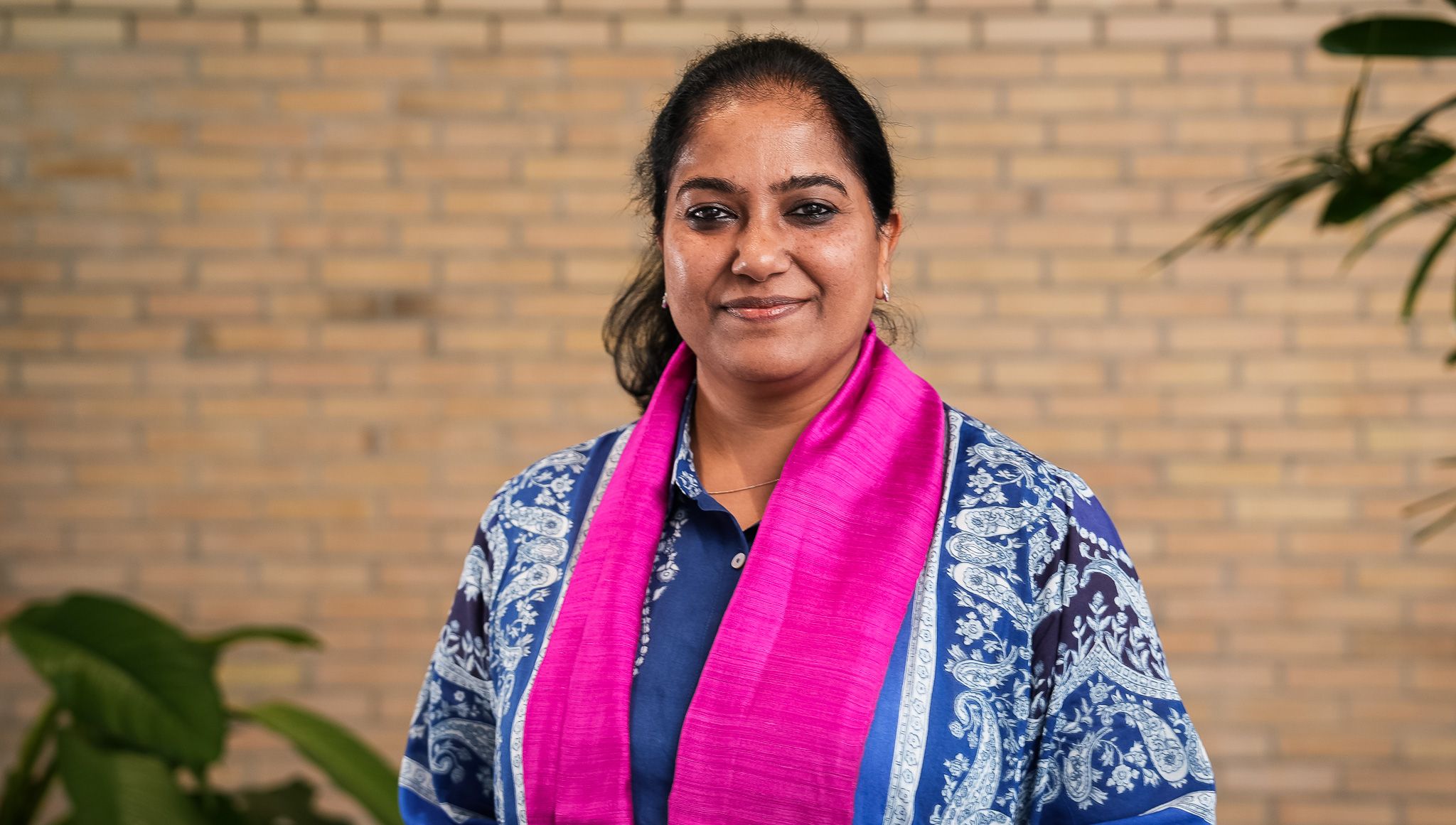 portrait of Indian woman smiling into camera