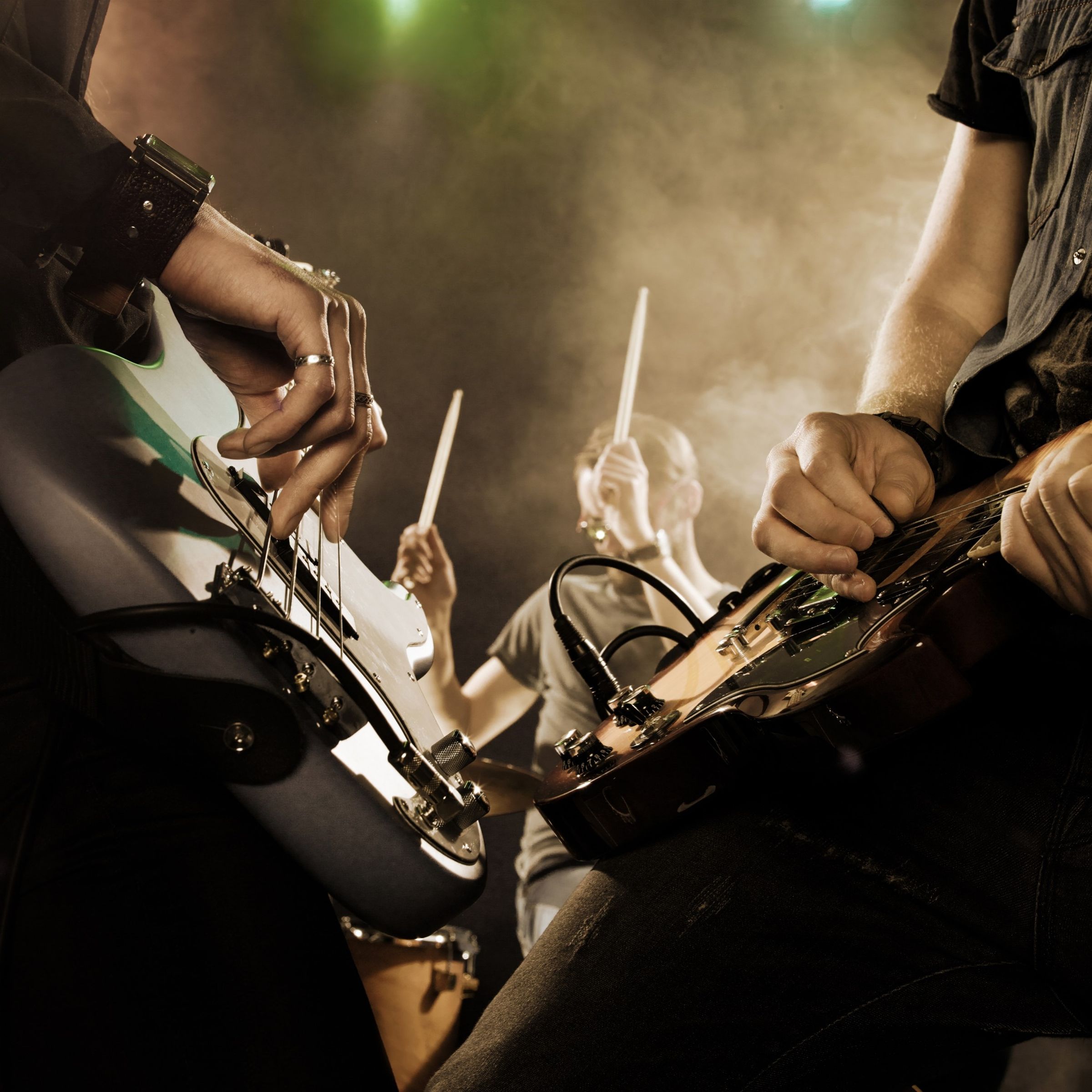 a guitarist, a bassist and a drummer – empower teams