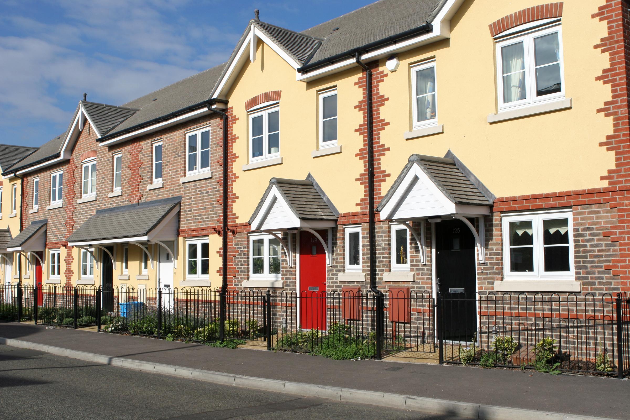 A row of neat terraced houses.