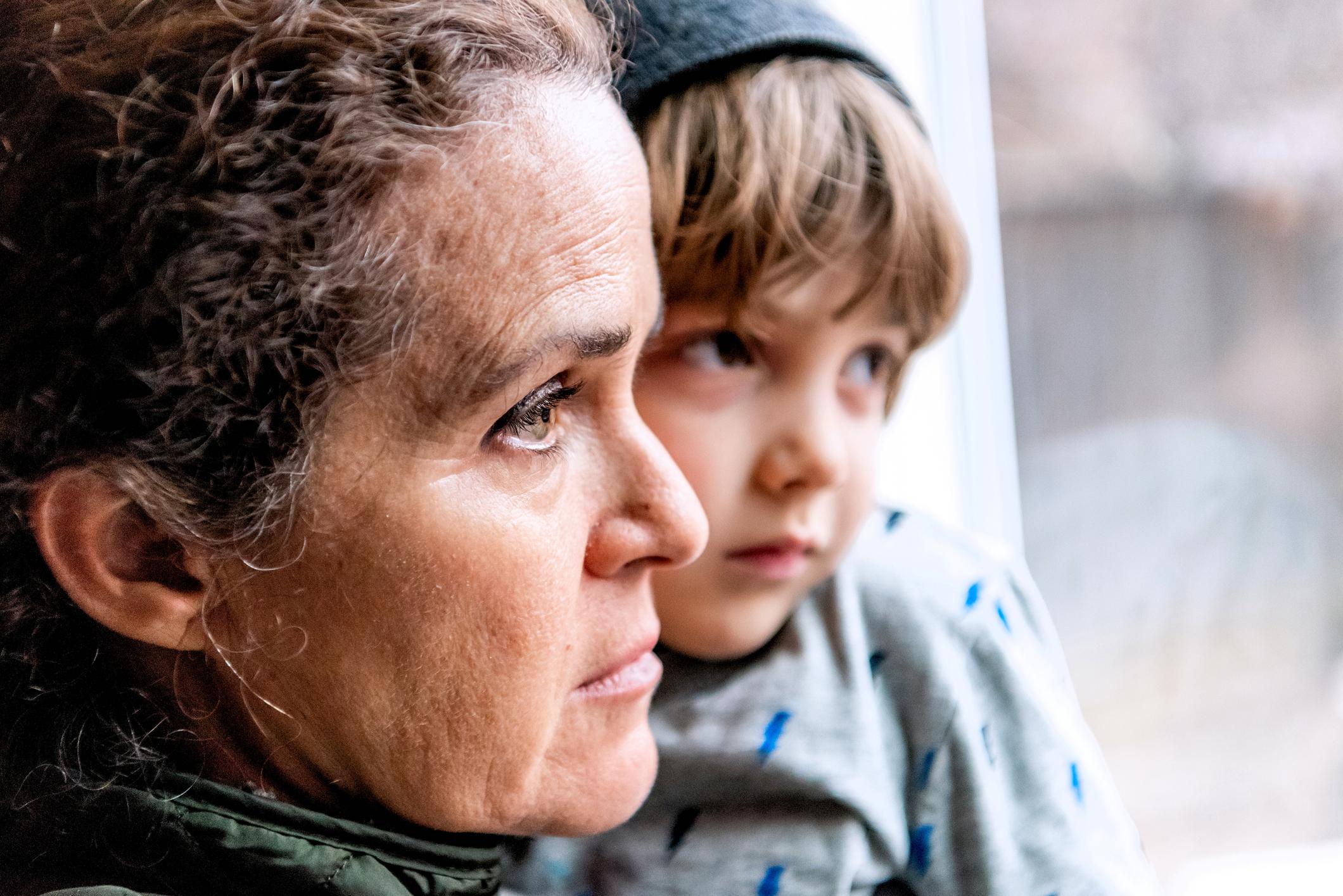 Mother with her son looking worried.