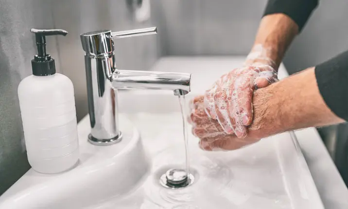 rinse hands with water