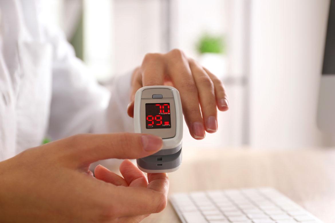 Oxygen saturation monitor with finger clip (the patient is breathing