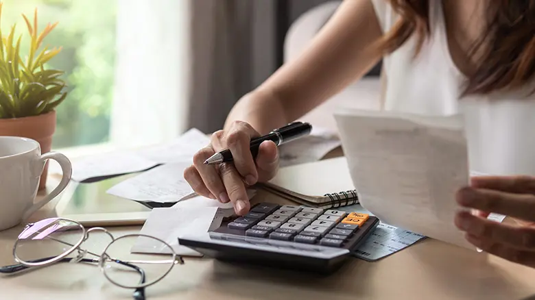 Lady using calculator