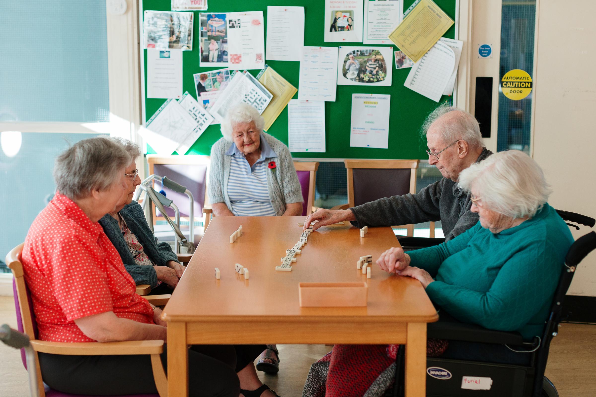 Residents playing dominoes at Bedford Court, Leeds