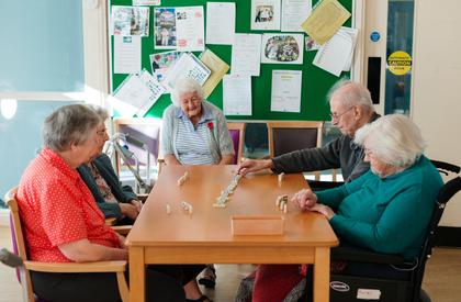 Residents playing dominoes at Bedford Court, Leeds
