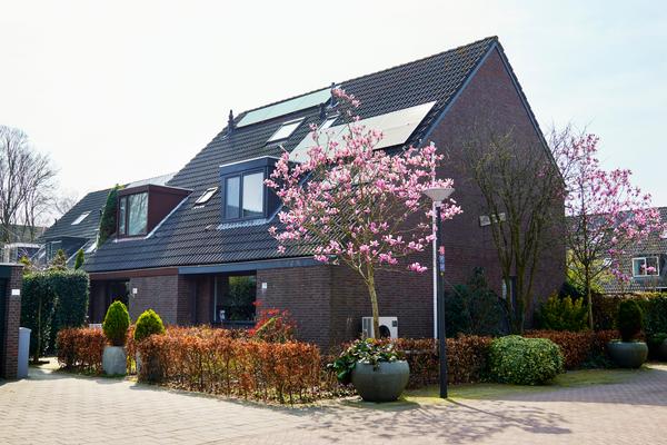 Huis met warmtepomp en zonnepanelen