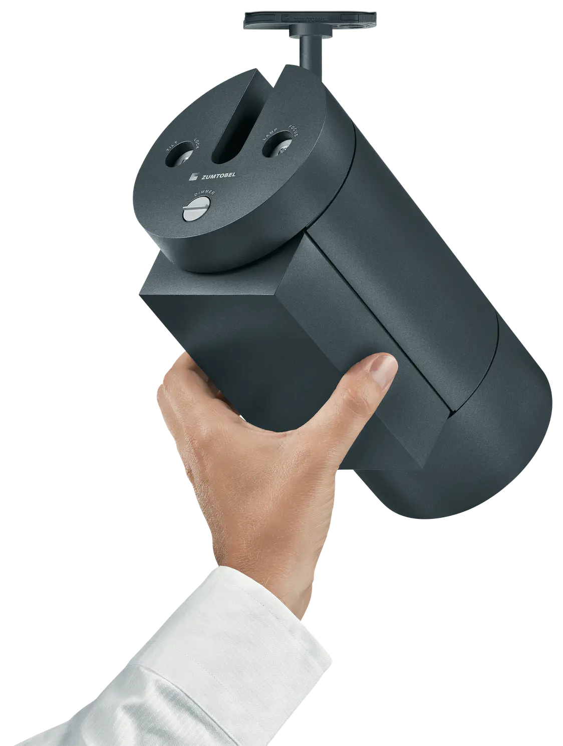 Eine Hand hält das schwarze ARCOS-Beleuchtungssystem in einem neutralen Raum, das mit einem modernen, zylindrischen Design überzeugt.