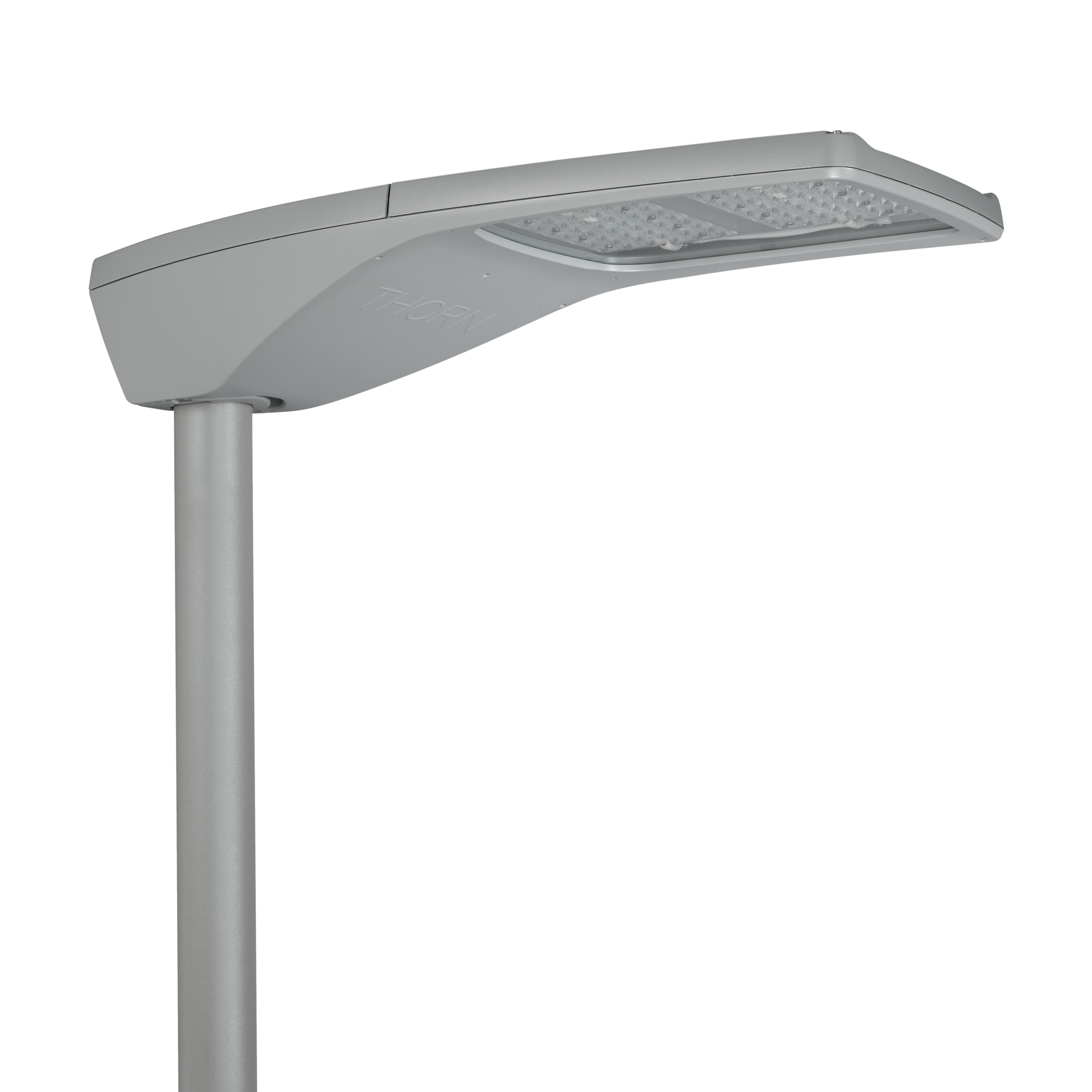 A sleek, modern LED streetlight with a silver finish, mounted on a cylindrical pole. The luminaire features an energy-efficient LED panel and a minimalist design.