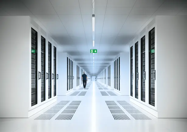 A data centre with modern lighting is visible in a long corridor. 