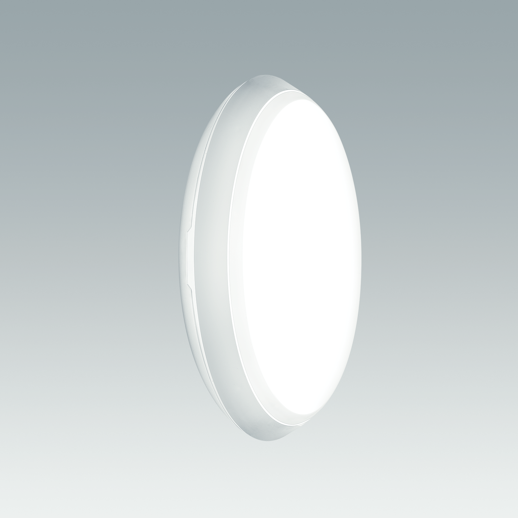 A circular LED wall or ceiling light with a compact and sleek design. The fixture emits soft, diffused light, making it suitable for residential or commercial environments.