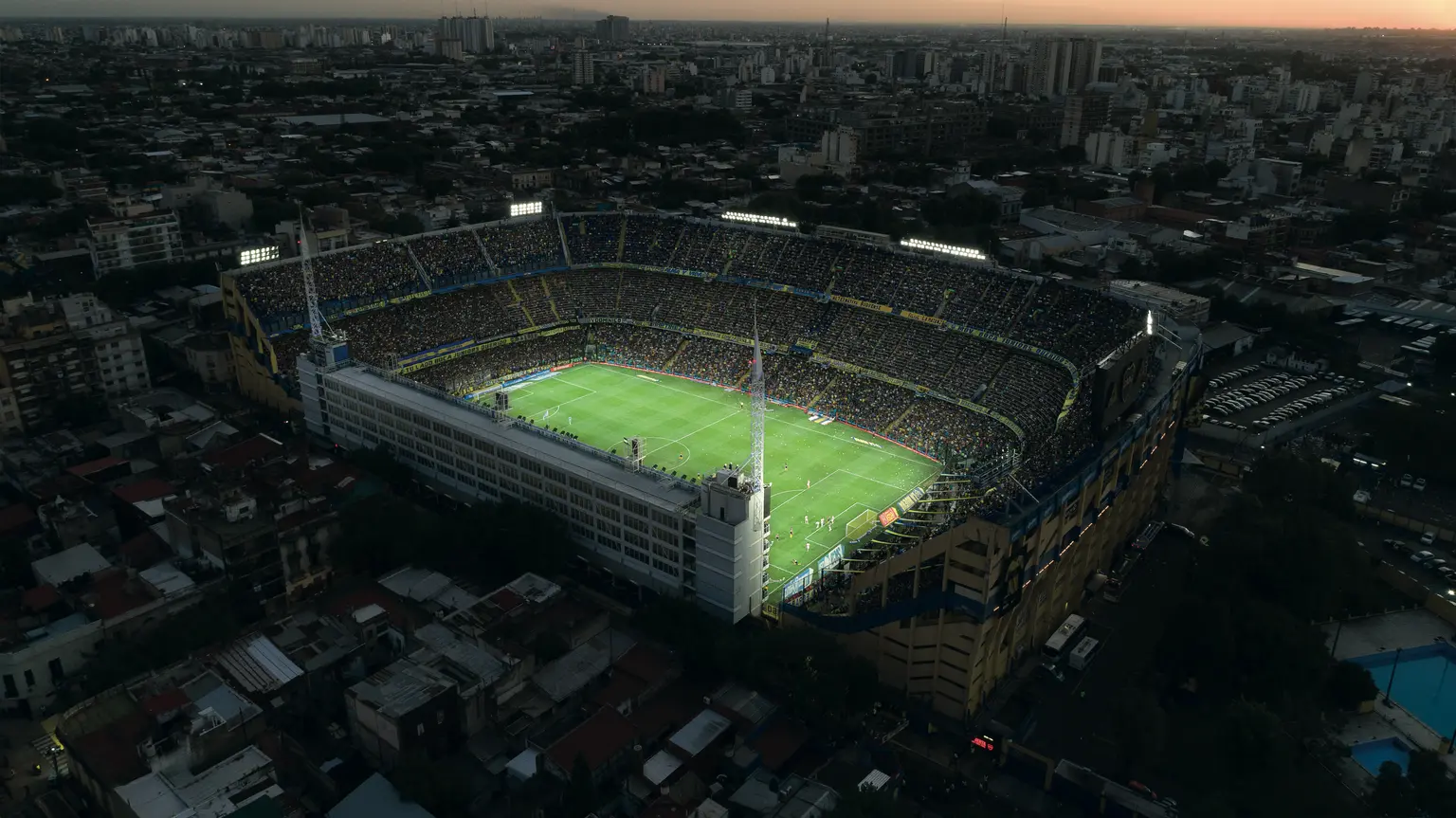 Boca Juniors La Bombonera at night with a game being played