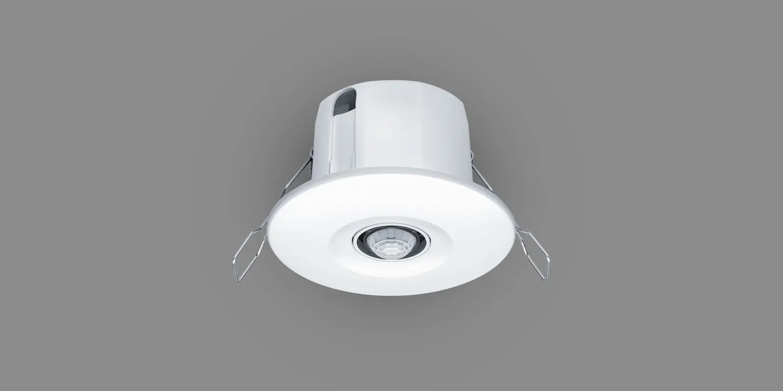 Ceiling-mounted motion and light sensor for smart room management by Zumtobel Lighting