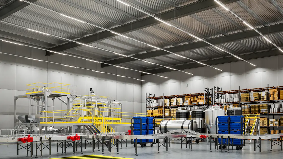 Una linea di produzione con attrezzature illuminate in modo efficiente