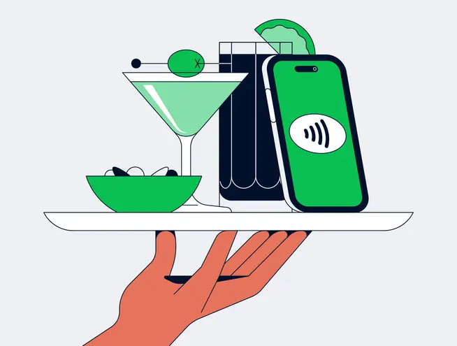 Ilustrace ruky držící tác s martini, miskou oříšků a chytrým telefonem zobrazujícím symbol bezkontaktní platby.