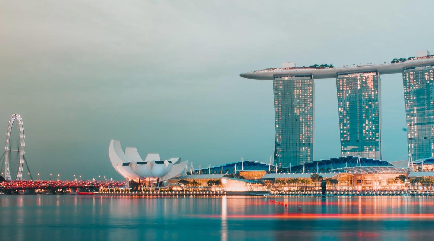 Singapore skyline at dusk with Marina Bay Sands and the Singapore Flyer.