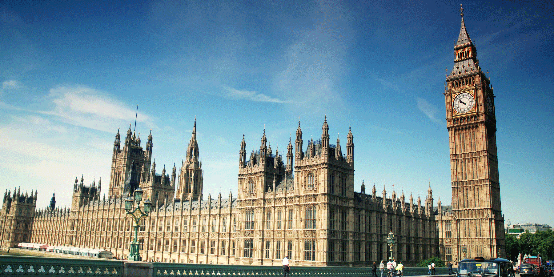 The iconic Elizabeth Tower with the Big Ben clock and the Houses of Parliament in London.