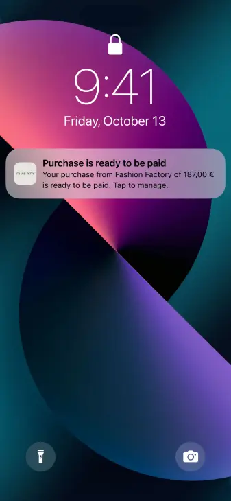 Smartphone screen showing a notification for a purchase ready to be paid with Adyen.