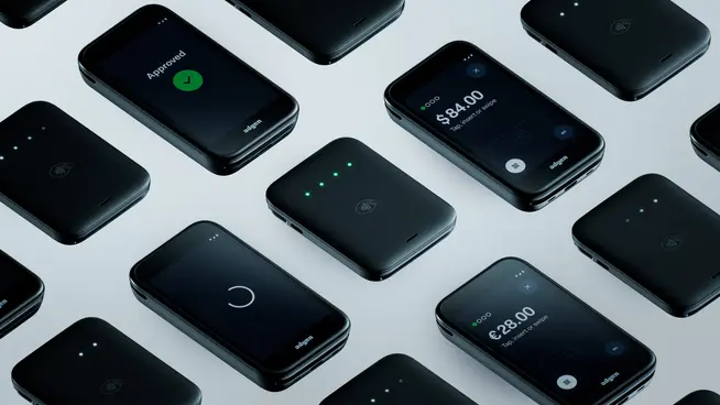 Multiple Adyen payment terminals showing transaction statuses such as approved and payment amounts.