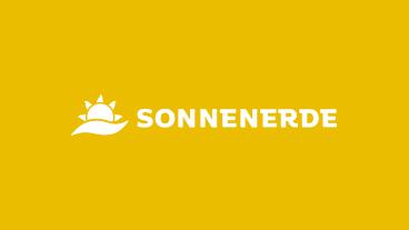Sonnenerde logo with sun and plant graphic on yellow background.