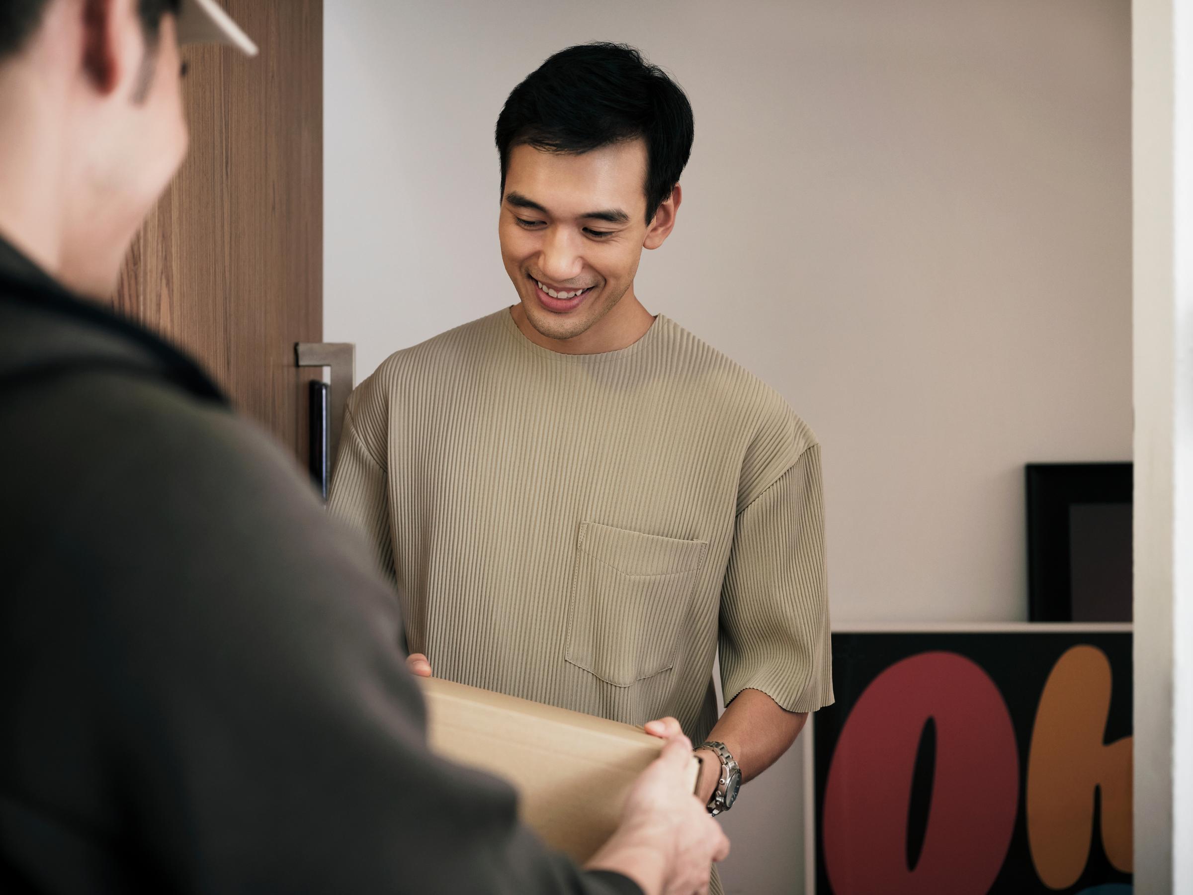 Couple at home shopping online on ecommerce website