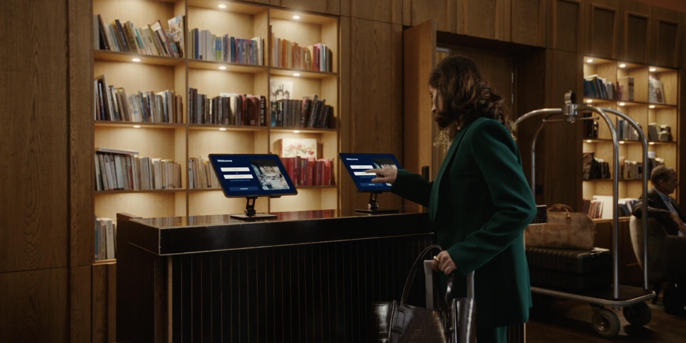 Woman using hotel human-free checkin-in