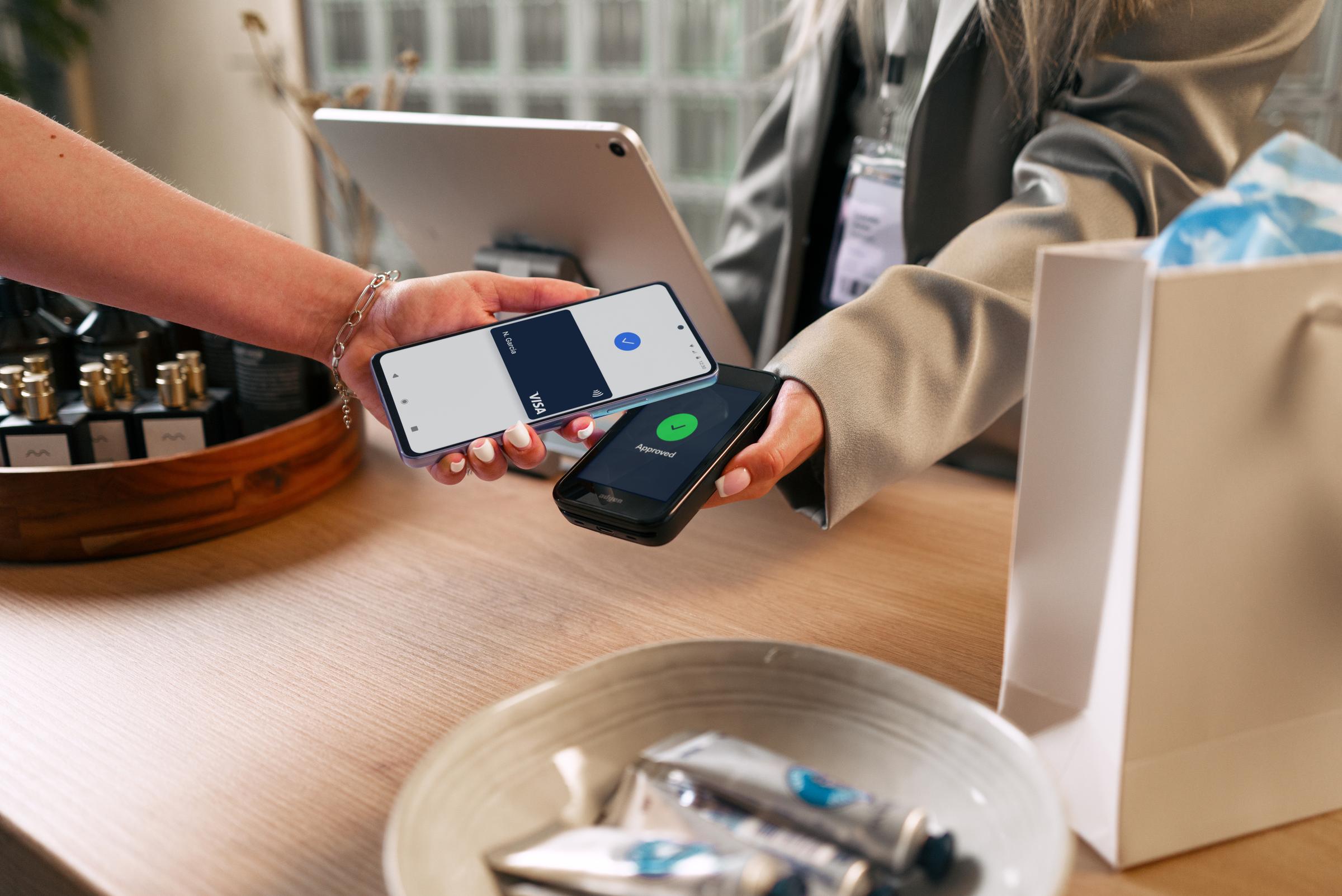 Phone payment with Visa on AMS1 in retail cosmetics setting