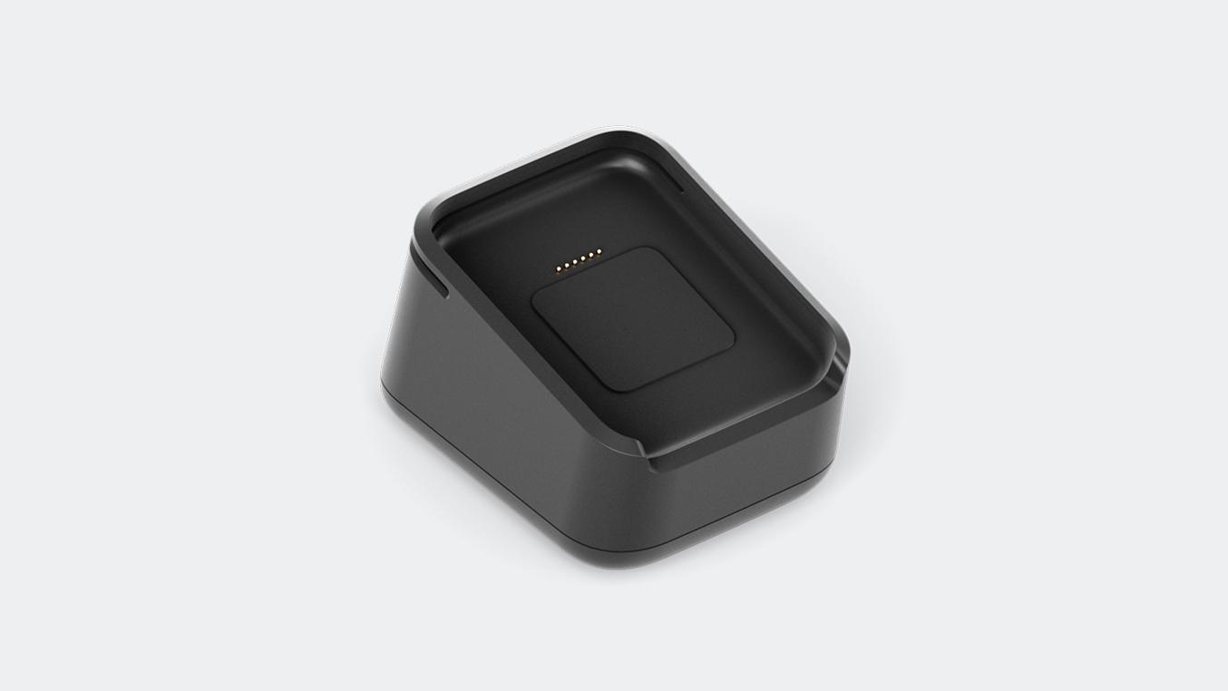 Wireless payment terminal with embedded charging dock, branded with Adyen logo.