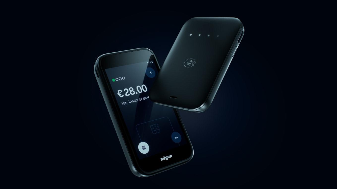 Two Adyen terminals showcasing checkout interface with a payment amount of 28.00 euro.