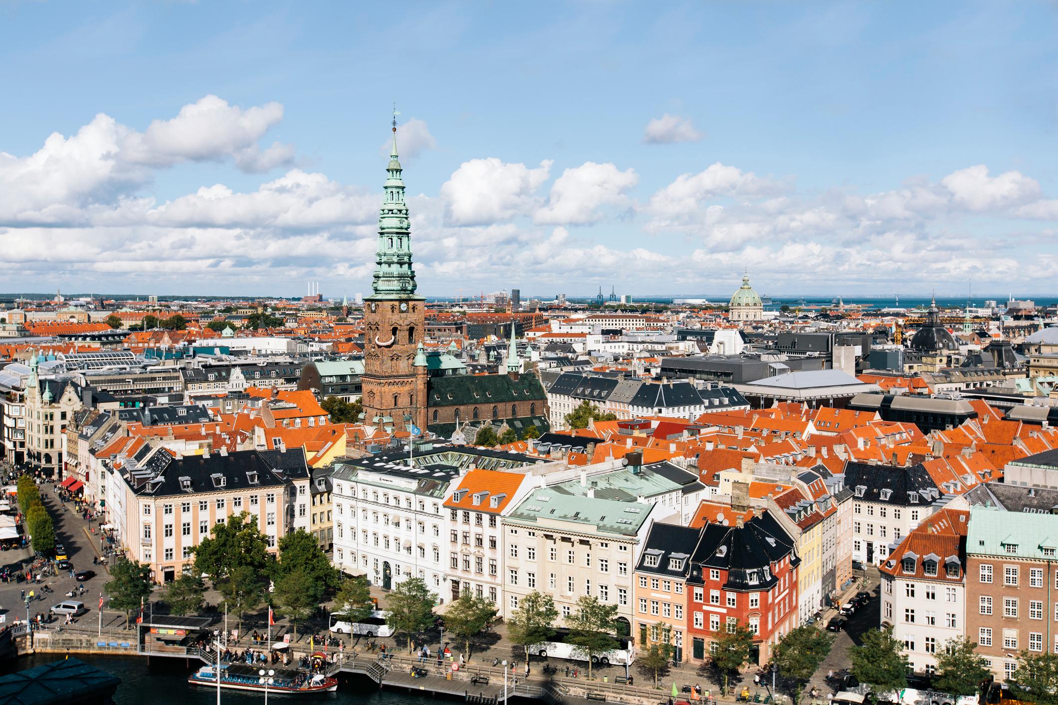 Copenhagen aerial view city skyline with tower St. Nikolaj Church on a sunny day, Denmark.