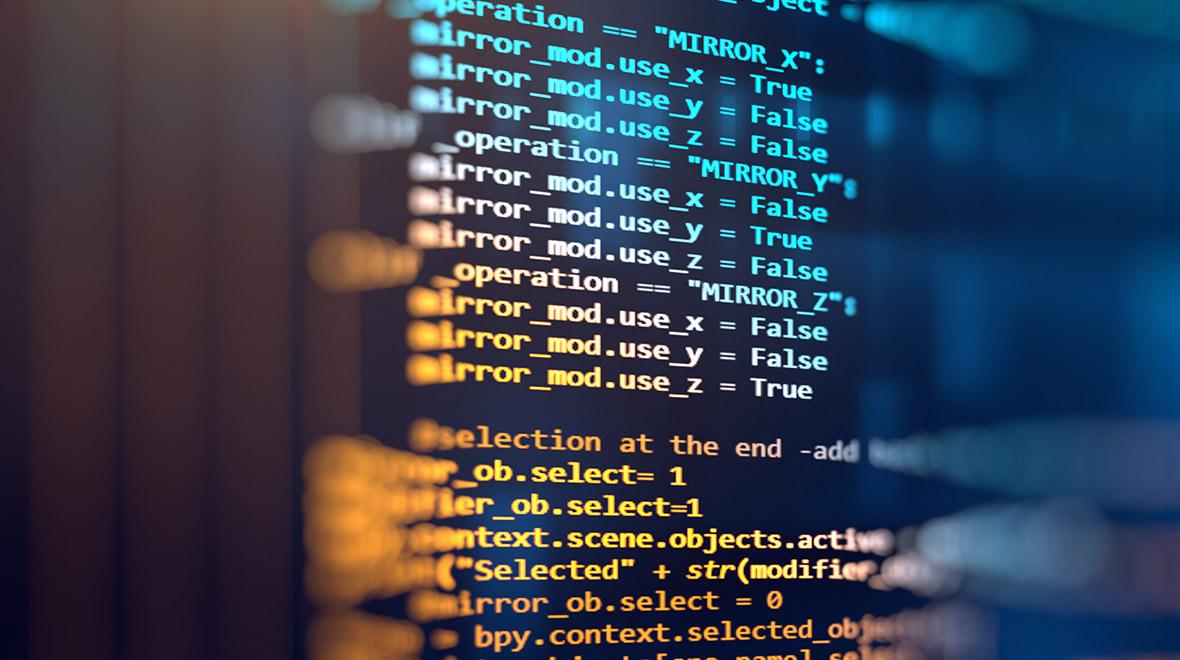 Close-up do código do computador na tela com efeito bokeh