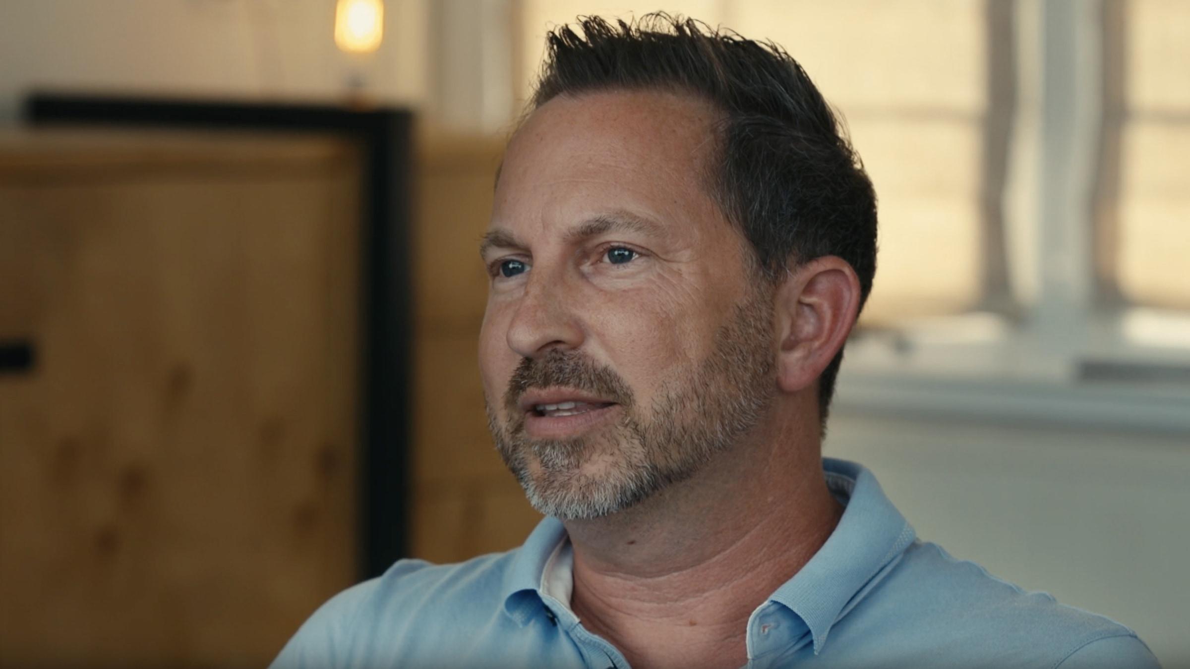 A screenshot of a Trevor talking in front of the camera