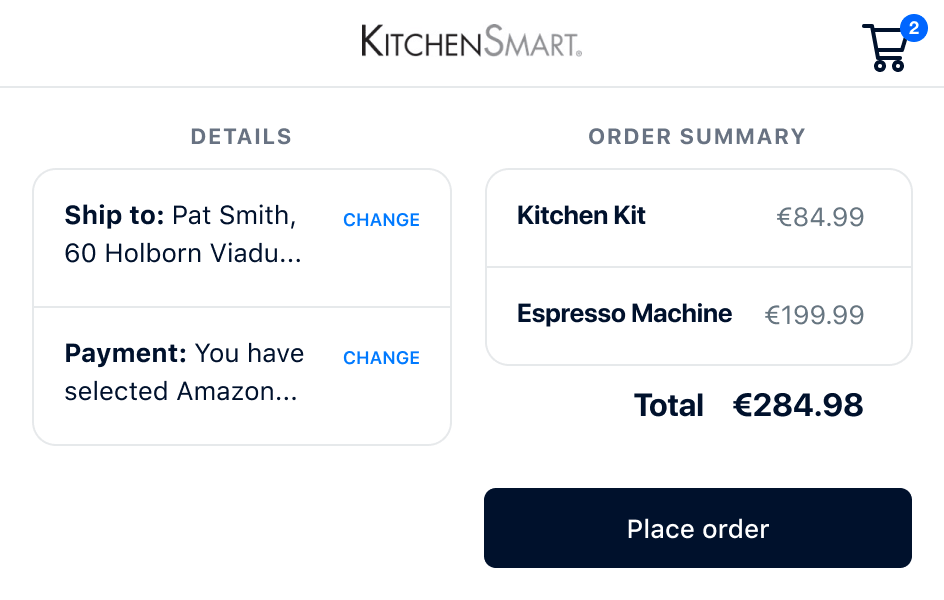Checkout screen with shipping details, payment method, and order summary for a kitchen kit and espresso machine totaling €284.98.