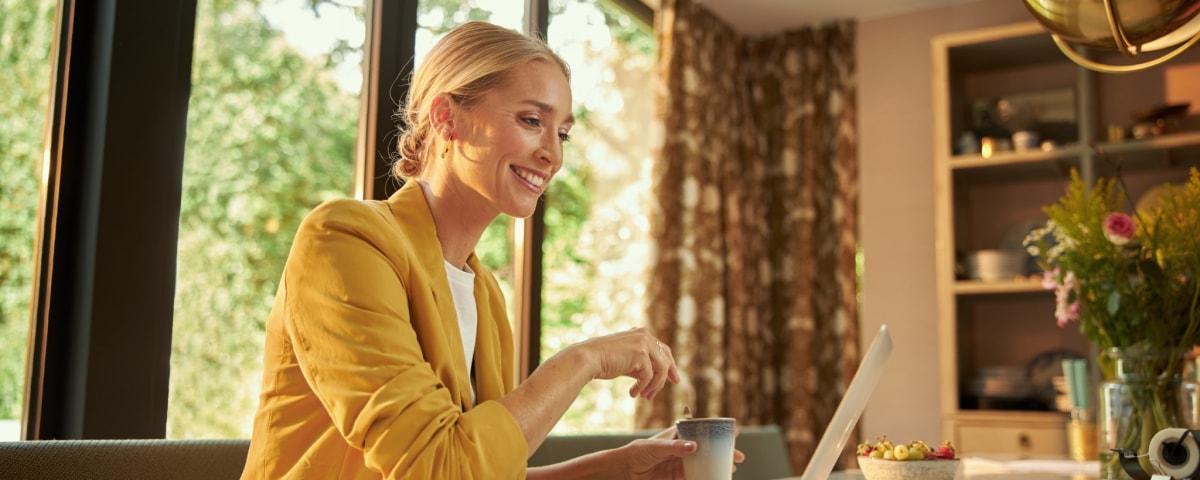 Person using laptop to sell remotely