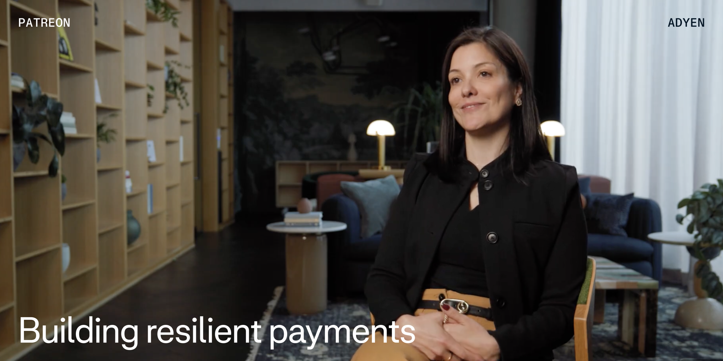 An artist working with multiple monitors in an office setting