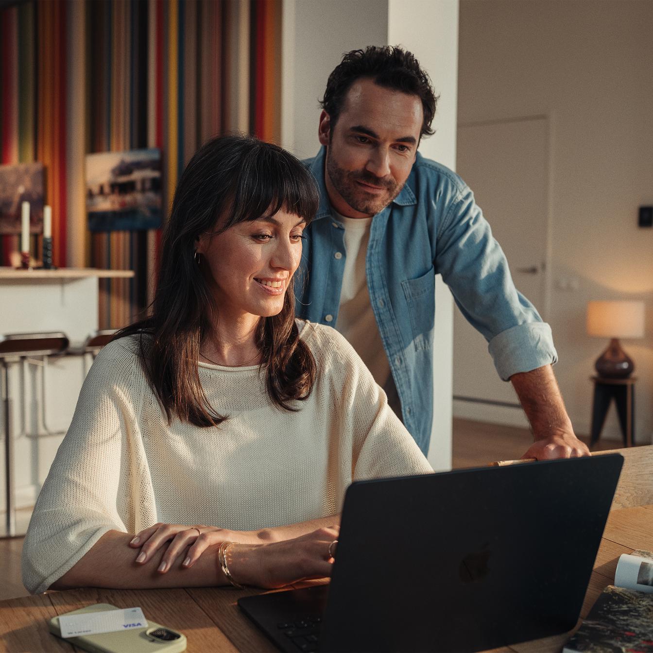 couple looking at laptop