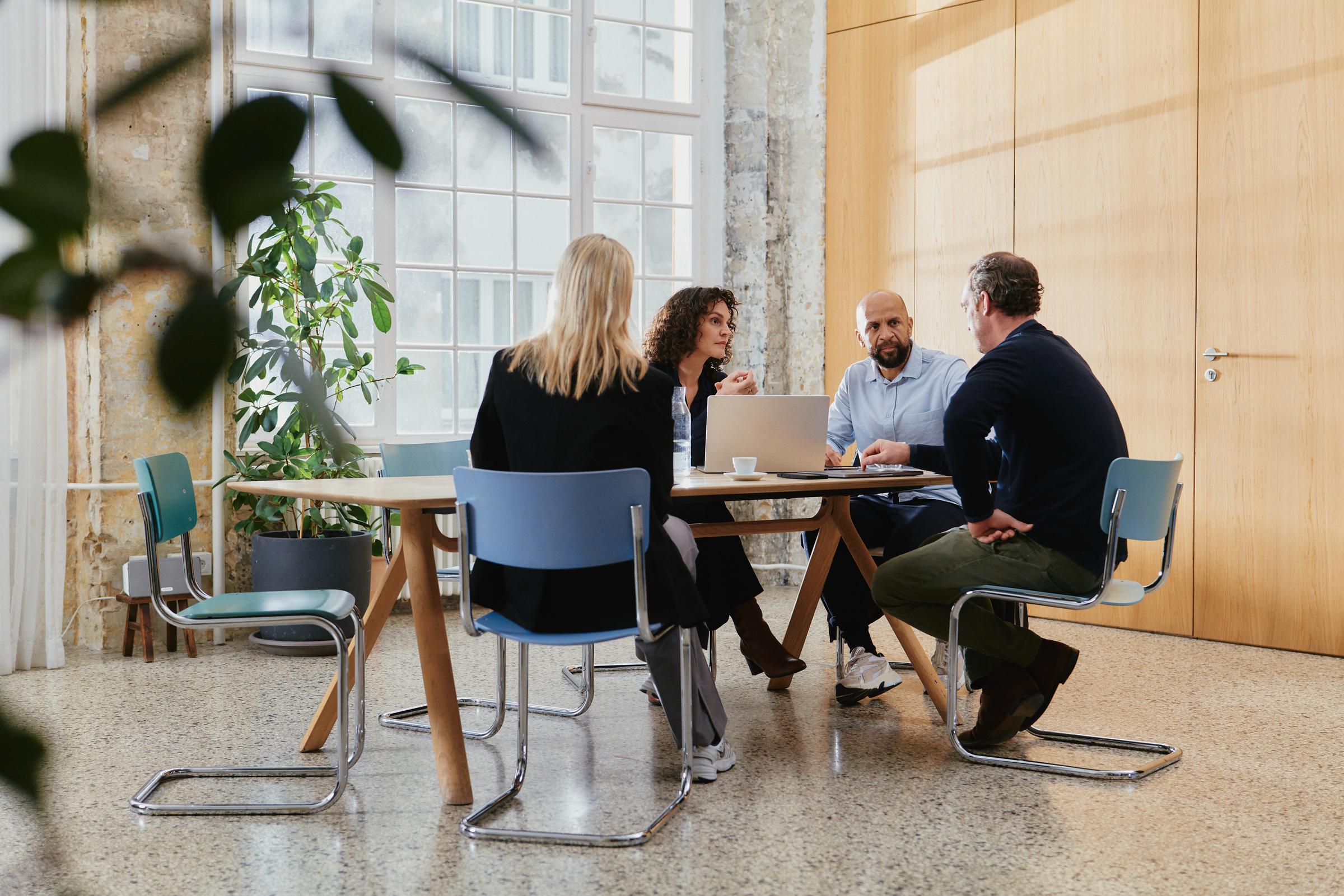 Colleagues of a tech Saas company in meeting