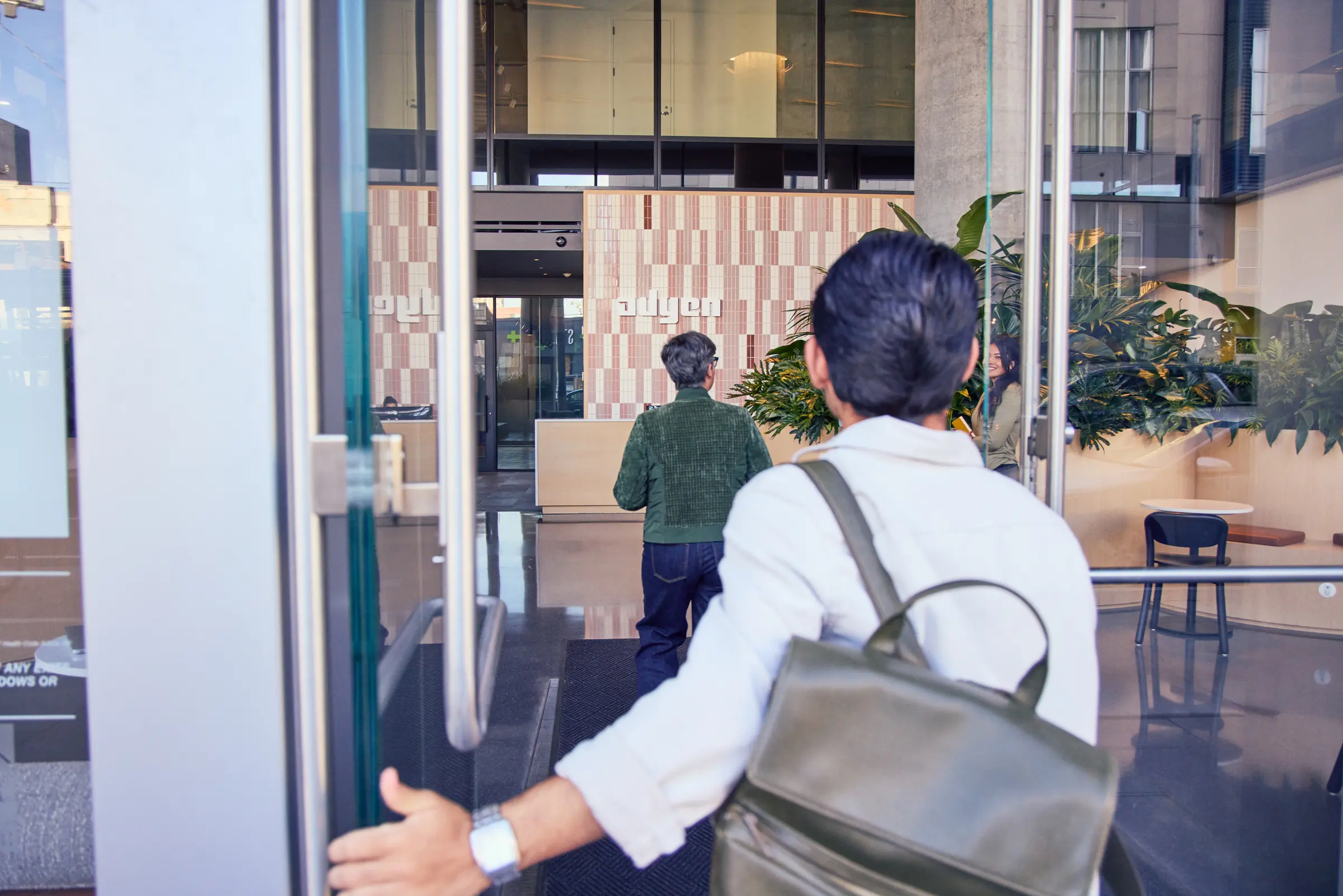Employee entering SF office building