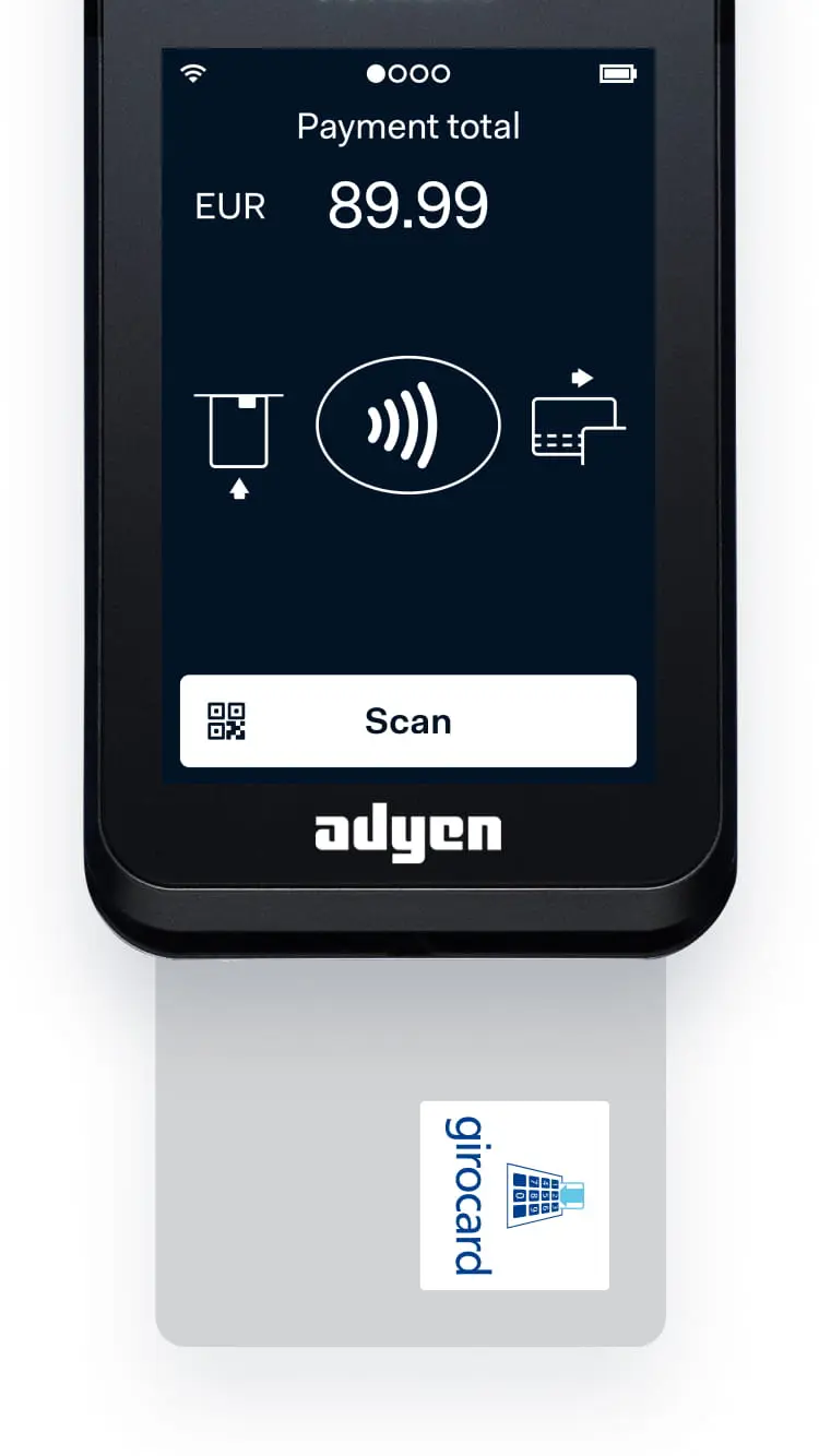 Smartphone displaying a payment total of EUR 89.99 with Adyen interface and a Girocard on card reader.