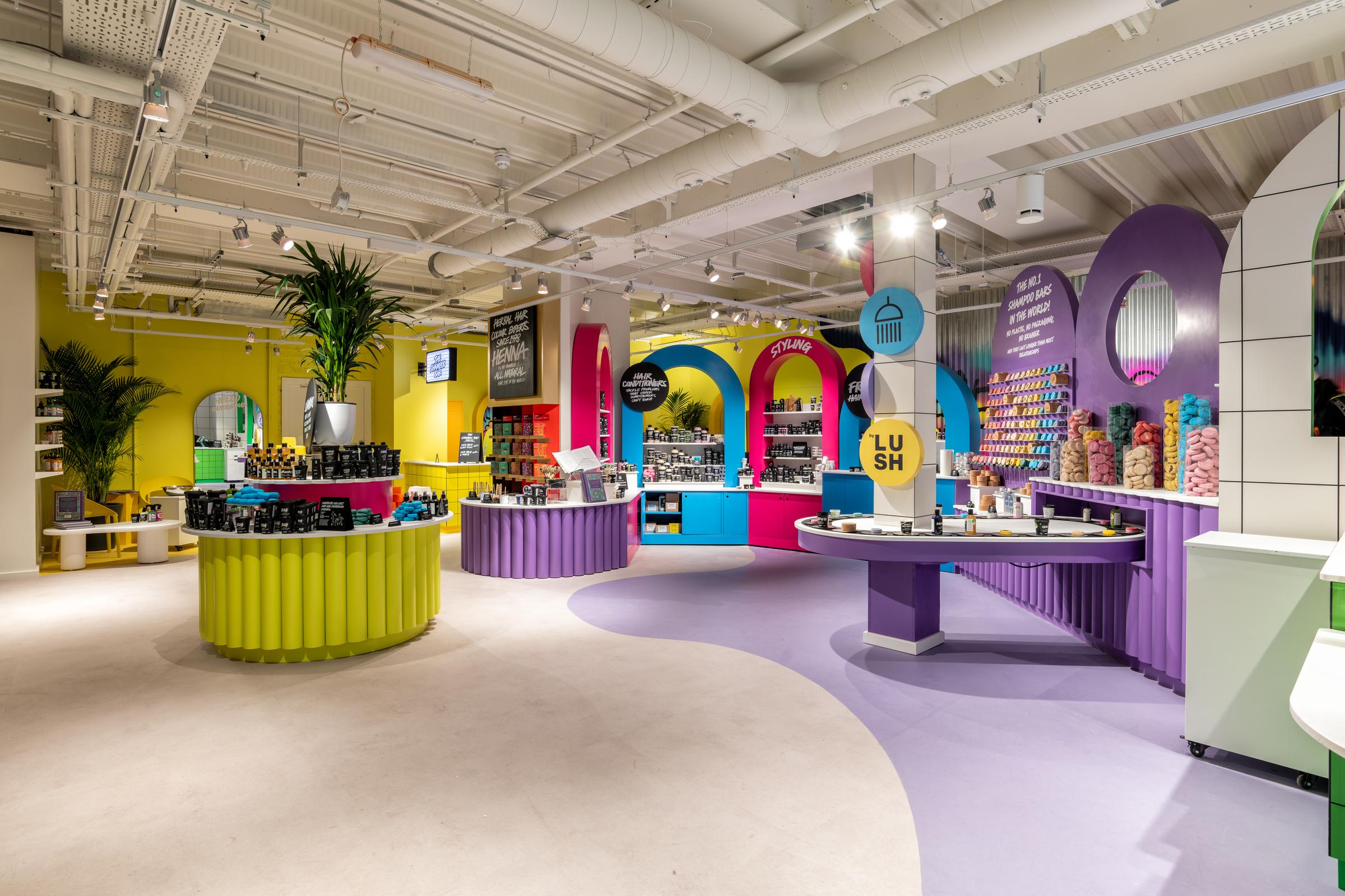 Interior of the LUSH store in Glasgow, featuring playful displays of bath products.