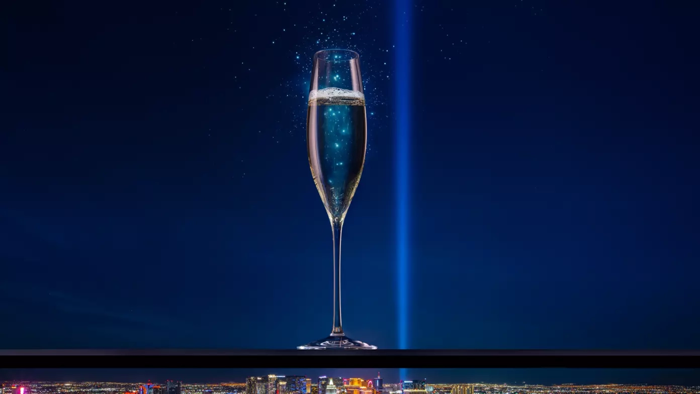 A glass of champaign on the rooftop of the Skyfall lounge.