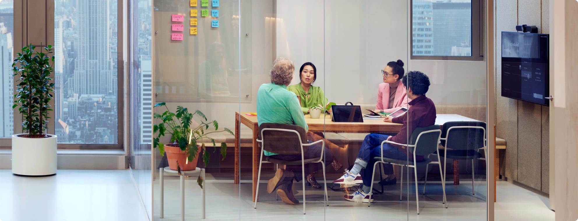 People at a table discussing 