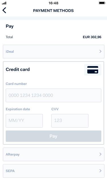 Mobile screen showing Adyen payment methods including credit card and iDeal.