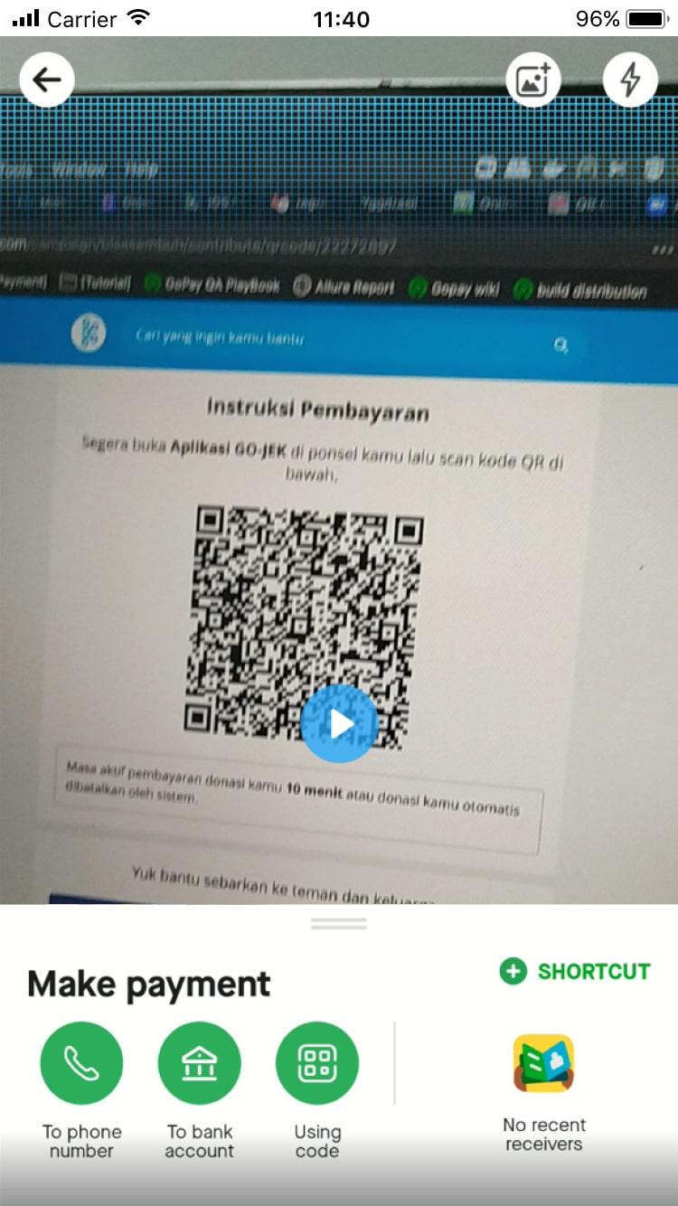 Smartphone showing a QR code payment instruction and options for making payments.