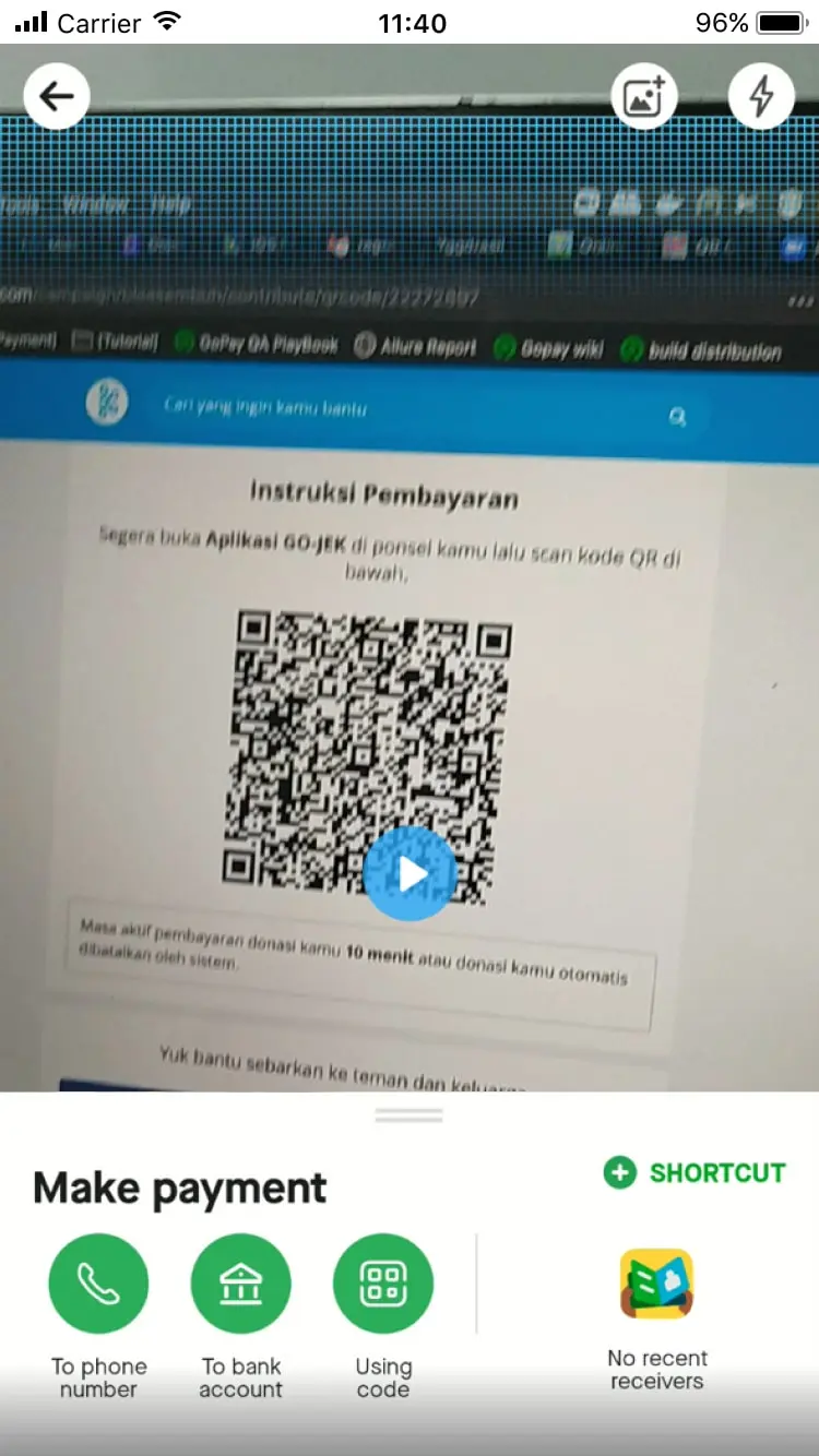 Smartphone showing a QR code payment instruction and options for making payments.